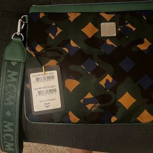 MCM clutch handbag with wrist band